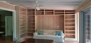Before and after bathroom remodel Clear cypress bookshelves to match original pickle finish, Jupiter island, Fl.