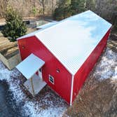 Silver Lining Kennels New 40’x60’ boarding facility. Metal interior walls and ceiling in the kennel area. Office area and closets are drywall with 1x s