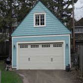 garage to match house New garage with artist loft built to match 1904 house. Reused windows and some siding from original garage. After and before phot