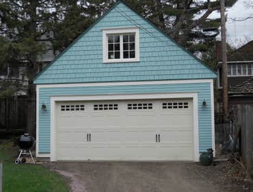 garage to match house New garage with artist loft built to match 1904 house. Reused windows and some siding from original garage. After and before phot
