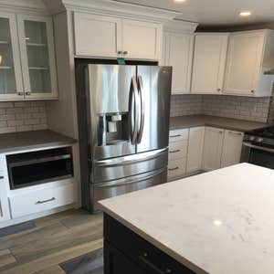 Photos by Currier Construction Co #1 Remove 2 walls to open kitchen, re design the layout, install new window and slider door, new tile flooring...