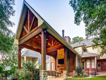 The Taylor The patio cover provides enough protected outdoor space for the hosts and their guests. The outdoor couch and accent table were hand-selecte