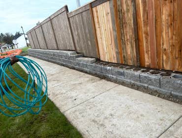 Photos by Leons Landscape Maintenance #16 Retaining wall and fence