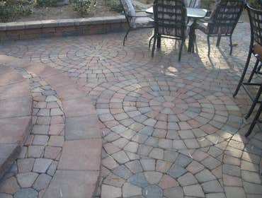 Tech-Noir Landscapes, Inc. Photos This display shows an array of fire pits, water features, and barbeques that add that special touch. Hard scape photo