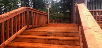 Hand Stained Deck w/ Custom Benches Meticulously hand stained deck to customer specifications. All sides of the decking were stained for maximum longev