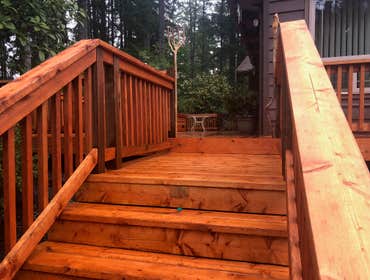 Hand Stained Deck w/ Custom Benches Meticulously hand stained deck to customer specifications. All sides of the decking were stained for maximum longev