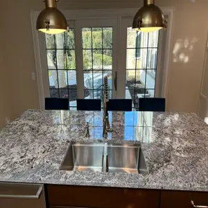 Bexley Addition Overview: Addition connecting existing home to garage.
Scope: Expansion of kitchen, laundry room, entryway, full bath, and butler...