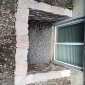 Landscape block window well Landscape block egress window wells. Homeowner got the block and we built the window wells out of it.