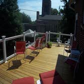 Photo(s) from American Deck Inc Wood Deck with White Vinyl Rails & Black Balasters, Sparks, MD 21152