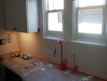 Photos from Love Remodeling Llc Built in custom entertainment center and custom oak floating shelves