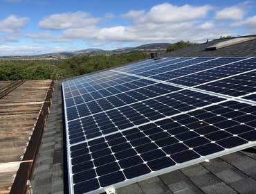 Installations Green Stock Solar ground-mounts and installations on comp, tile, and metal roofs!