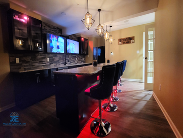 Photos by J&e Modern Construction LLC #15 Basement Renovation and Bar Installation