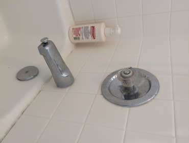 Bathtub Faucet @repair Leaking faucet replacement from back.