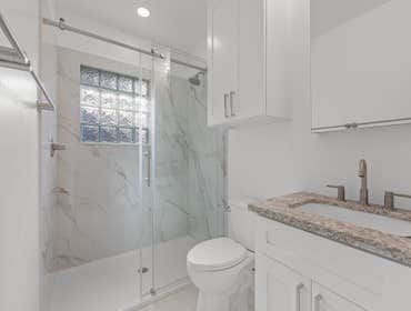 Classic White Bathroom Remodel in Sacramento, CA 95816 This bright bathroom remodel provides a timeless, elegant update. The design features classic wh