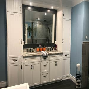 Custom Master Bath Complete bathroom renovation down to the studs. Small bathroom and bedroom combined to make a master bath and custom walk-in...