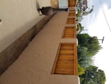 Custom Backyard Project 1.) 75 ft of CMU (block wall) with custom 1950s stucco texture design finish and top red cedar privacy panels with matching gat