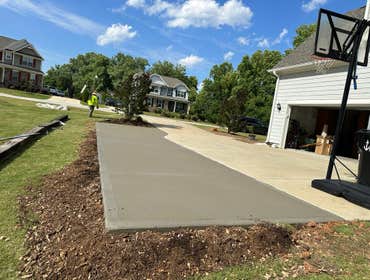 Two driveway extension done in Willow springs nc. The homeowner shared concrete with neighbors to save a concrete delivery.