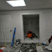 Photos by Dbs Remodeling #2 Cut out floor by to add new plumbing for the shower vanity toilet and tub also cut by out cider block by for door way frame
