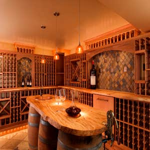 3 Barrel Island Wine Room A subterranean fitness room was chosen as an ideal location for a wine cellar. By modifying the structural support of the...