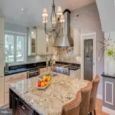 Photos by Carrafa Properties #2 This project was a complete Demo,Drywall,Painting ,Floors.Backsplash, Appliances & Granite.