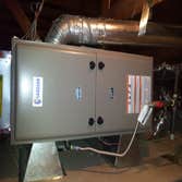 Anna A Installed forced heating unit in attic