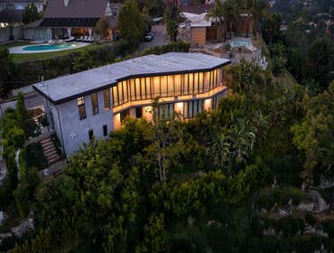 New Contemporary Home in the Hollywood Hills New contemporary home located in the Hollywood Hills with panoramic views over Los Angeles accentuated by 