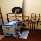 Photo(s) from Airco Heating And Cooling Inc This is an electric boiler system that was piped on a piece of plywood then brought to a remote cabin and i