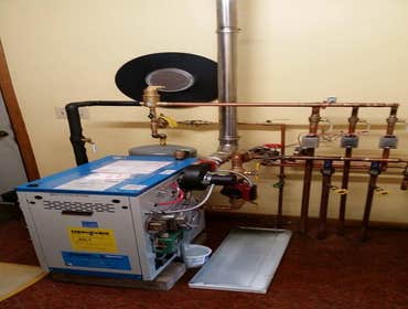 Photo(s) from Airco Heating And Cooling Inc This is an electric boiler system that was piped on a piece of plywood then brought to a remote cabin and i