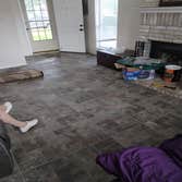 Rowlett, Texas Demo 1000 sq ft of carpet and vinyl plank floor and installation of 1000 sq ft of ceramic tile. Painted interior walls. Design and insta