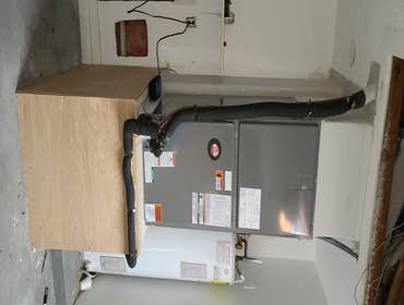 Photos by Idr HVAC Solutions LLC #2 New System with Relocation from attic to Garage with custom coffin box.