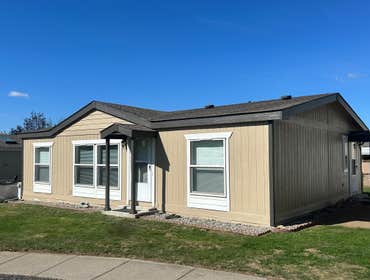 Photos by Access Realty & Construction #2 A complete exterior makeover, trim, shiplap, and paint