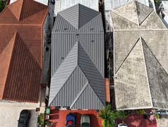 Photos by Gold Star Miami Corp #1 metal roof panels all are . 25 years warrantee