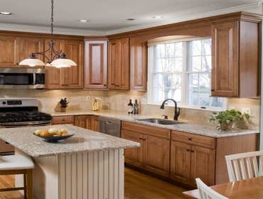 Kitchen Cabinet Refacing View our project portfolio to see our high-quality kitchen cabinet refacing restorations.
