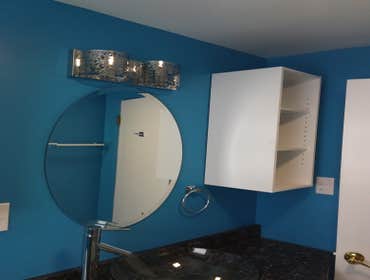 New remodeled bathroom New amenities with light fixtures and granite counter sink. Total bathroom remodeling.