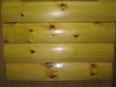 LOG CABIN SIDING KNOTTY PINE
