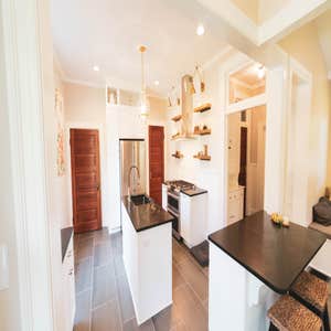 Large-scale Historic Renovation of 1st floor A historic renovation of the kitchen, rear living room areas, half bath, and various rear areas of the...