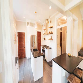 Large-scale Historic Renovation of 1st floor A historic renovation of the kitchen, rear living room areas, half bath, and various rear areas of the ext