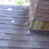 fireplace fixure reflashin shingles & tile floor fromcaroline brown. sand springs Ok, this the fixure of the roof fireplace and livingroom floor r