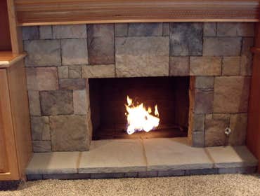 Fire Place Extraordinaire. We took a ugly tired fire place and made it into an awesome wall unit complete with custom cabinets, build in flat panel tv,