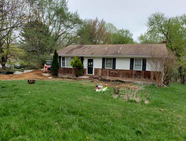 Photos by Marylands Best Remodeling LLC #3 Great garage addition and front porch. We also replaced the entire roof and all new siding!
