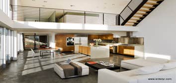 Apartment and condo buildings 10 unit mixed use condo building over a 2-story concrete subterranean garage. This modern building sitting right on the 