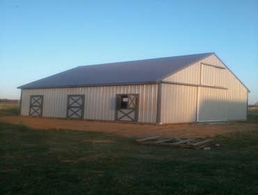 Cheap Pole Building PA : The Ann Masly Building Dimensions : 30'Wx36'Lx10'H
(2) Split Sliders
(3) 4'x7' Dutch Doors
(3) Center Aisle Slider Doors
