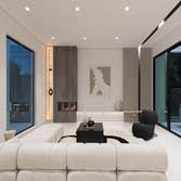 Contemporary living room with fireplace in a Silicon Valley luxury custom home by Ritz Builders