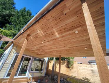 Photos by Stewart & Son Gate & Fence LLC #1 Tiny House with pergola. Small house 17' by 12' small bathroom with pocket door, and small sink with water 