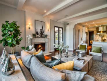 Custom Mediterranean-Style Home Renovation This stunning Mediterranean-style residence underwent a comprehensive renovation to enhance its elegance and