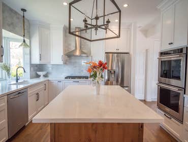 Full Modern Beachside Kitchen Remodel Get inspired by this misty white kitchen by the sea.
Our client was looking to open up her small galley style 