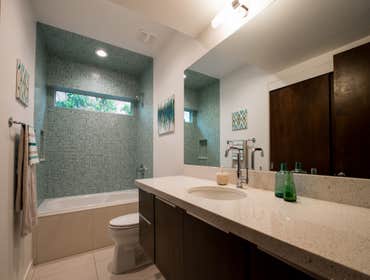 Photos by Monkey Wrench plumbing, Heating & Air #1 Complete remodel of mid-century modern home. Also added a half bath on main level as well as a secon