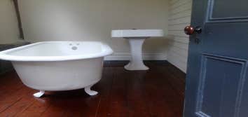 Antique claw foot tub & sink