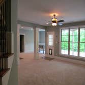 Finish basement from Jarman Homes, Inc. Finished basement: kitchen area, bathroom, stairs, playroom, bedroom & added steps & patio to rear deck