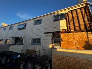 Photos by Santiago's Bay Builders Inc #1 Remodeling half of the building
